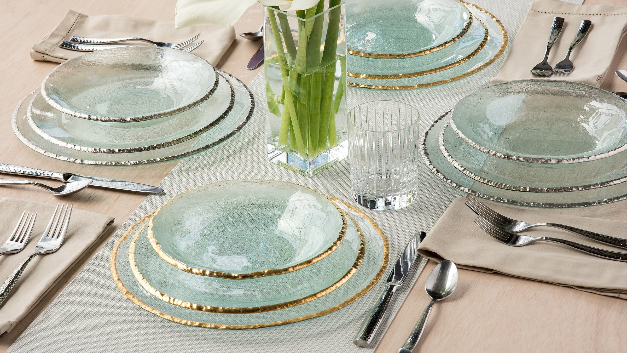 Edgey dinnerware and serving pieces with 24K Gold or platinum rims are easily dressed up, or add a splash of elegance to the ordinary when used every day.