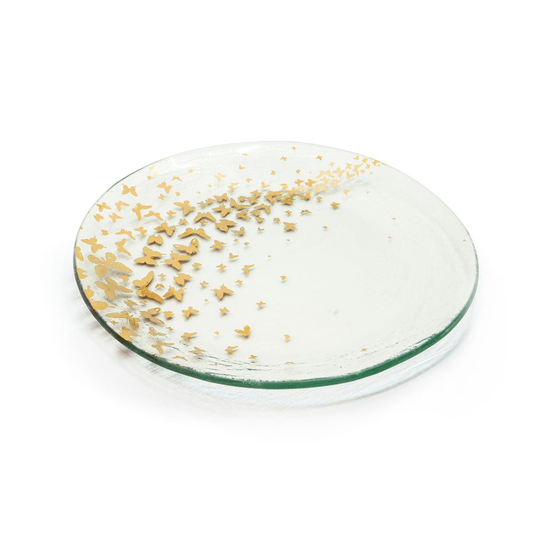 Clear dinner plate with 24k gold small butterflies on it.