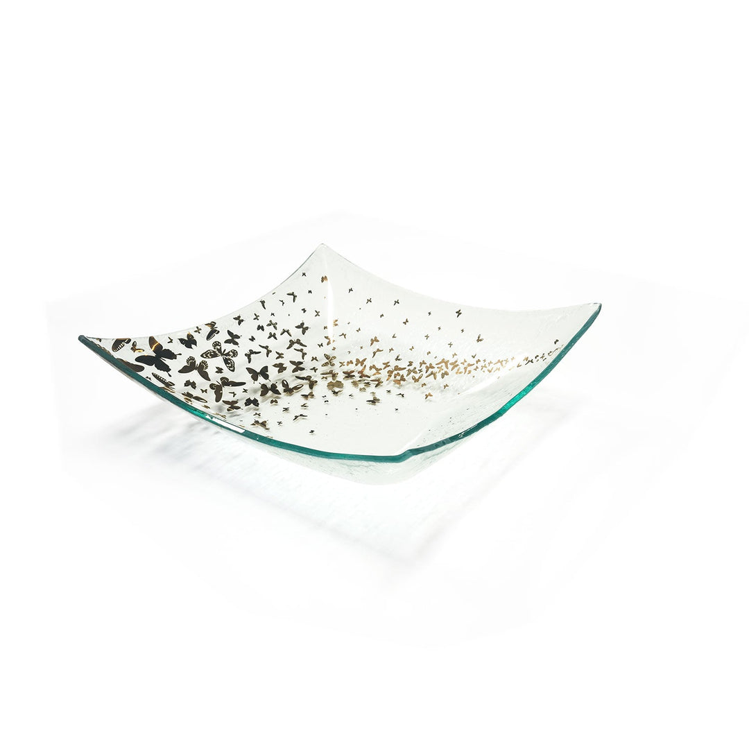 Butterfly clear four point bowl with small butterflies off to one side.