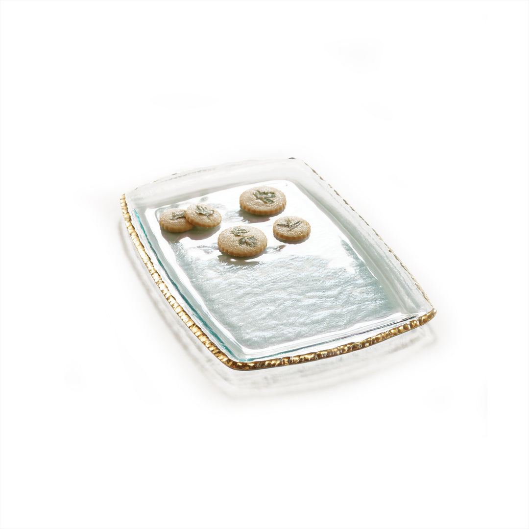 Clear tray with a 24k gold edge & cookies on a white background.