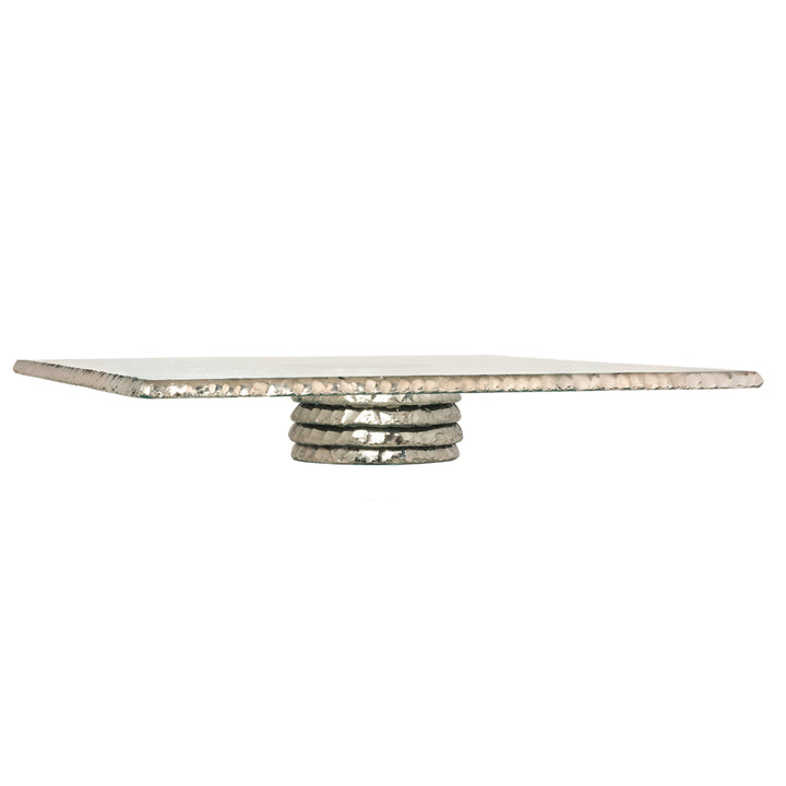 Edgey square cake stand with a platinum edge and base on a white background.