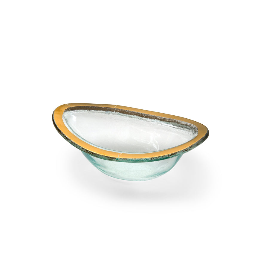 Small sauce bowl on clear glass with a 24k gold band.