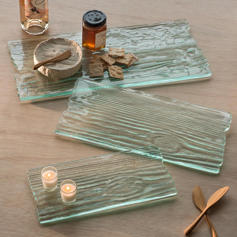 Rectangular wood textured glass cheese boards in three sizes.