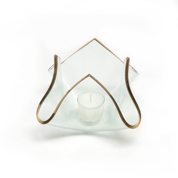 Clear 5" high candle votive with a 24k gold trim.