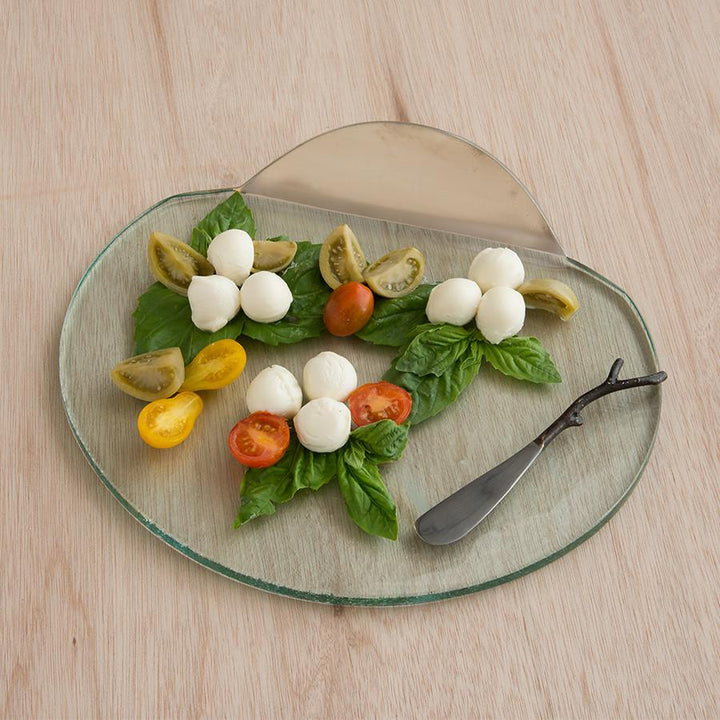 Platinum medium mod rounded platter with a caprese salad.