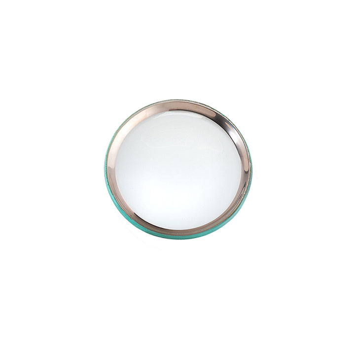 Small clear plate with a platinum band on a white background.