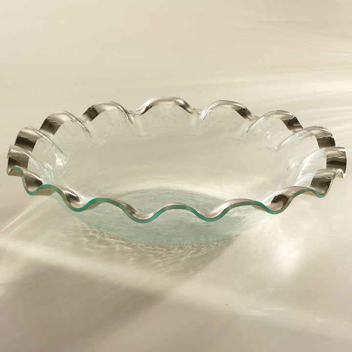 Handmade ruffle large salad bowl with a platinum band on clear glass.