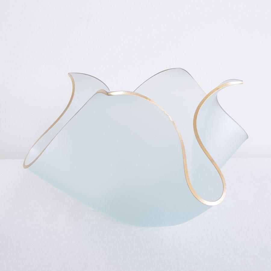 Frosted Glass with a 24k gold trim in the shape of a tulip.