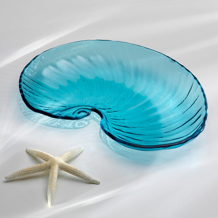 Handmade large shell shaped nautilus with ripples and a star on the outside.