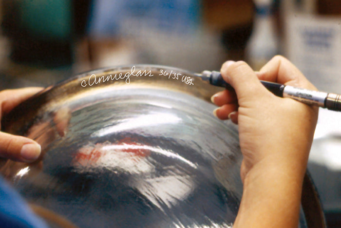 Example of Annieglass's engraving. Every piece is engraved to ensure authenticity.