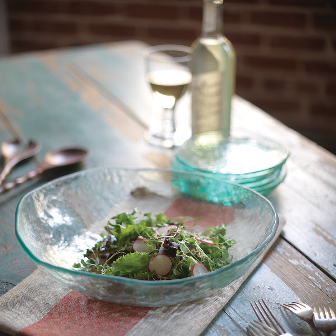 Large clear serving bowl from Salt Collection with green salad
