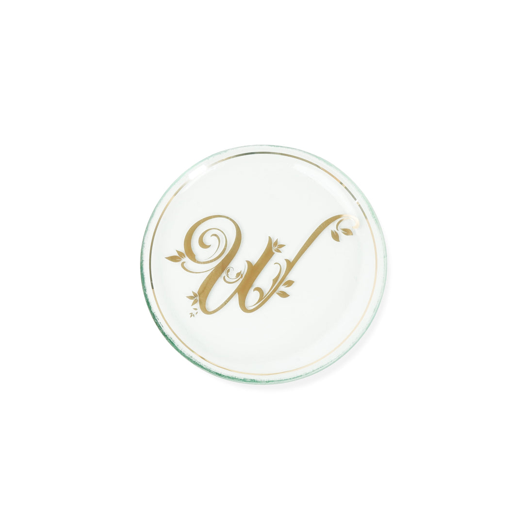 Mini plate with the letter W in the center & rim around made in 24k gold. 