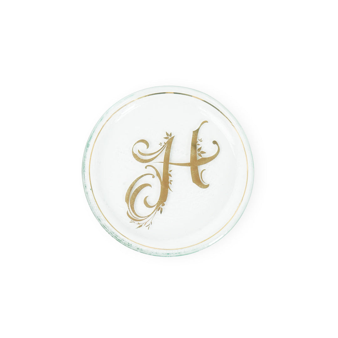 Mini plate with a 24k gold rim & the letter H in the center on a white background.