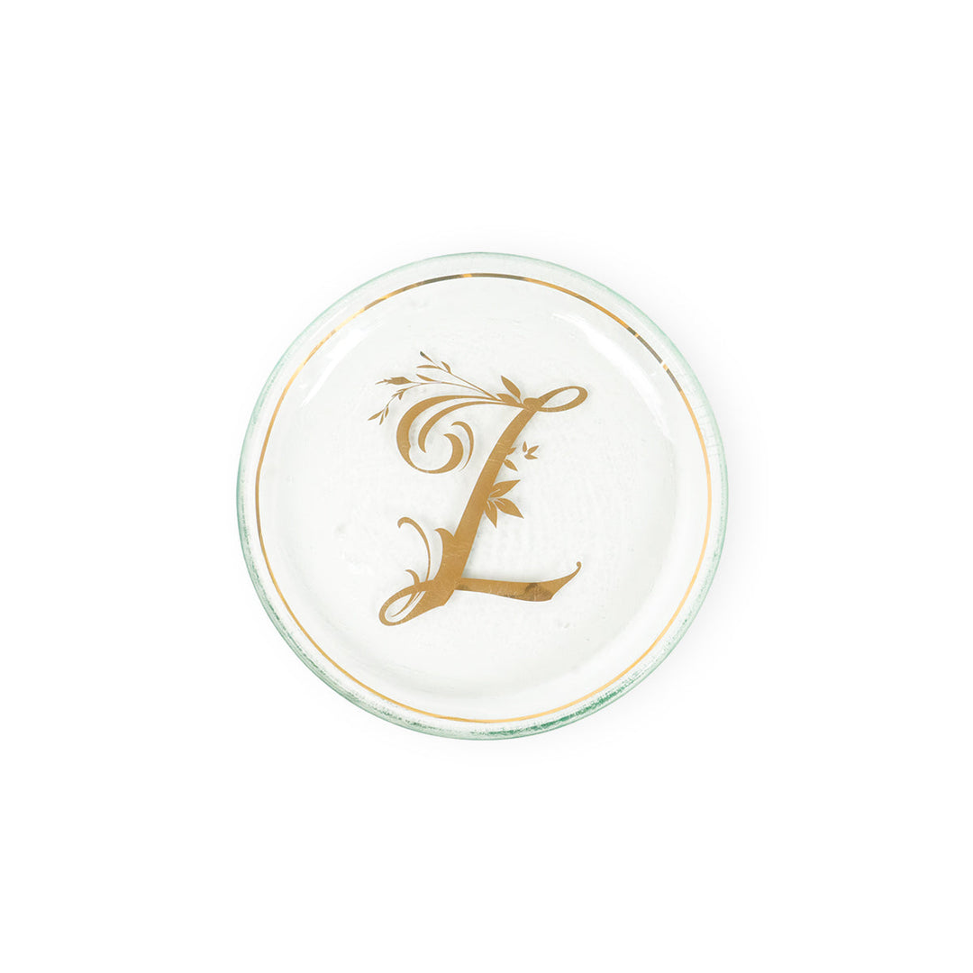 Clear mini plate with 24k gold rim & an L in the middle.