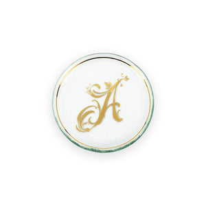 Initial mini plate with a 24k gold rim and letter A.
