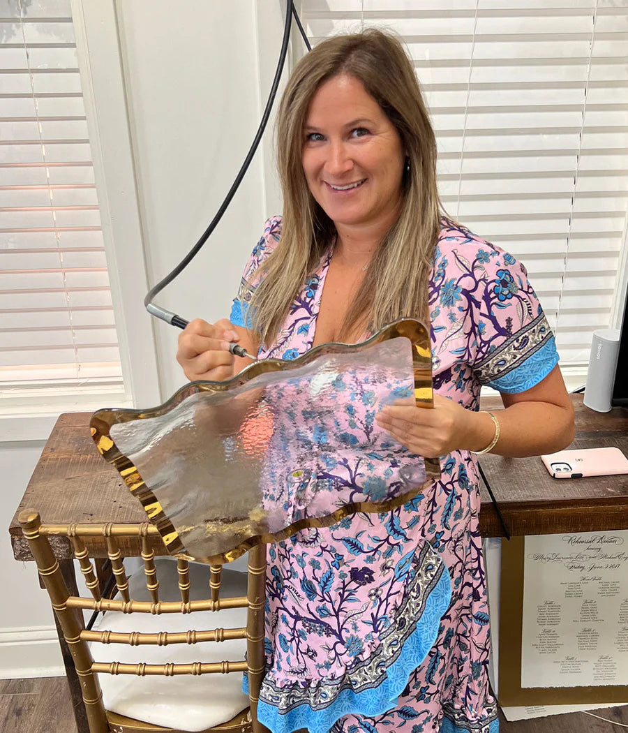 Ava engraving a Ruffle platter