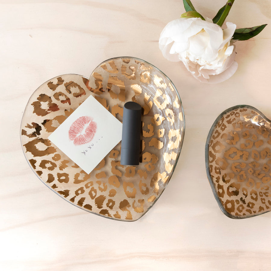Annieglass glass heart plate with 24k gold cheetah pattern with a lipstick on top
